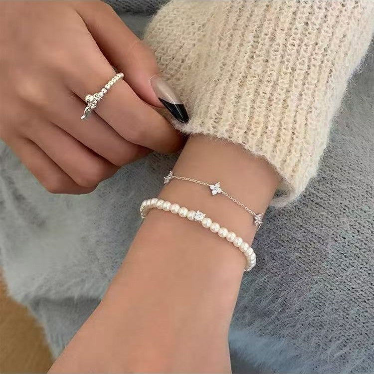 925 スターリングシルバー四つ葉のクローバーパールブレスレット女性のためのニッチデザインライト高級絶妙な積み重ね可能な親友ギフトジュエリー